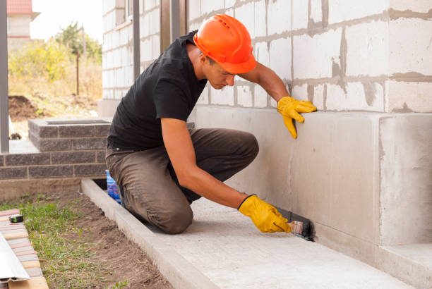 Waterproofing professionals working in Elwood, KS